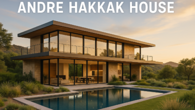 Stunning view of the Andre Hakkak House showcasing modern architecture and eco-friendly design, Exterior of the Andre Hakkak House with glass walls and contemporary landscaping