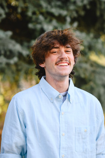Aiden Langston speaking at a Utah business event, inspiring local entrepreneurs and youth.